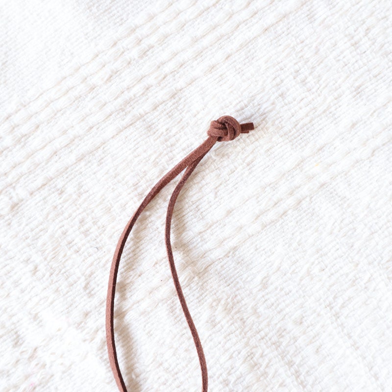 発送時、紐を緩めに結んでおります。用途に応じてお使いください。